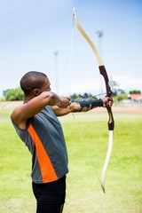 Athlete practicing archery