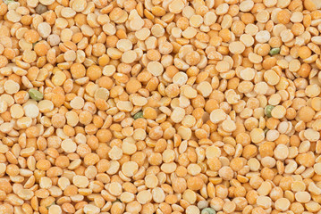 Uncooked yellow peas as background