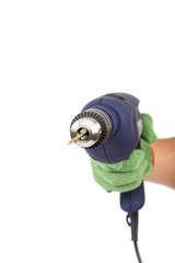 Hammer drill or screwdriver in hand on white