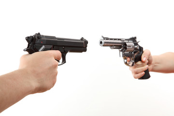 two white hands hold gun isolated on white background