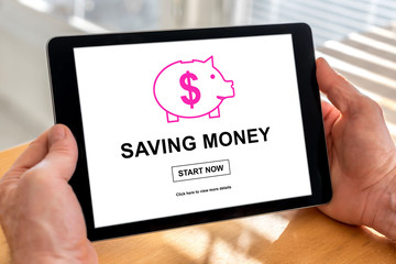 Saving money concept on a tablet