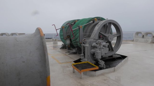 Mooring winch on aft of vessel in ocean