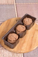 Brown biscuits cookies with chocolate in plastic packaging