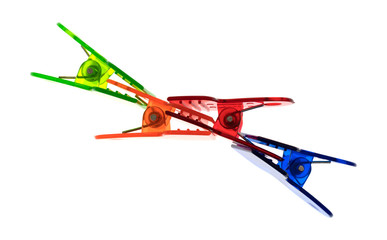 Plastic clips clipped together top view isolated on a white background.