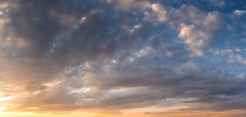 Naklejka na ściany i meble sunset vivid and bright sky background with clouds