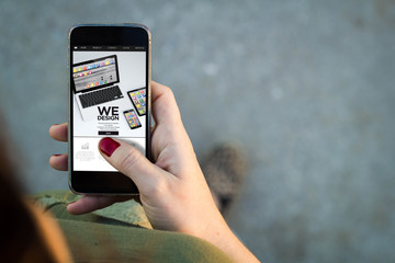 Woman walking smartphone we design