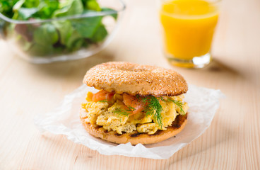 Breakfast sandwich on bagel with salmon,egg