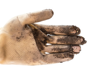 hand wearing an old dirty and broken pvc glove