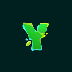 Y letter logo with green watercolor splashes.