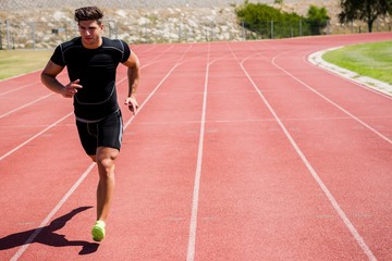 Athlete running on the racing track