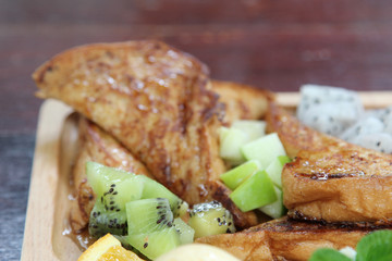Honey toast : French toast , fresh fruit and ice cream with caramel sauce.