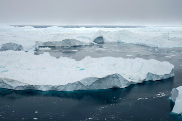 Fototapeta na wymiar icebergs on arctic ocean in Greenland