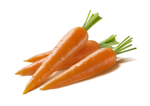 Diagonal fresh carrots isolated on white background