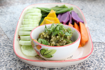 Northern Thai cuisine, spicy green chili pork with boiled vegetables.