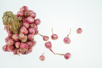 Dried red onions on white background