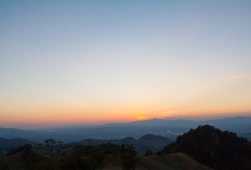 mist on mountain when sun rise