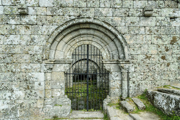 entry in ruins to the Romanesque church in the town of Monsanto, Portugal