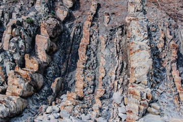 Rock face with cracks and fissures