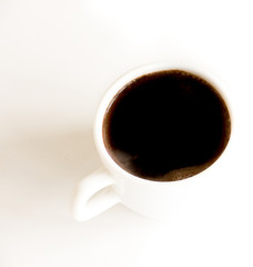 The coffee cup.