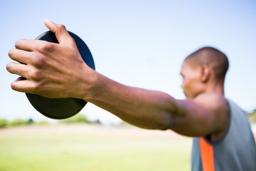 Athlete holding a discus