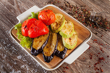 assorted vegetables barbecue, on a wooden board in deloy plate,