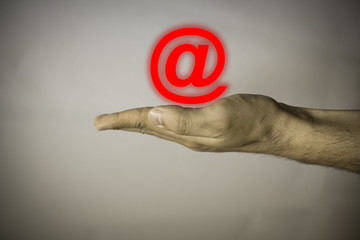Human hand on vintage background with social symbol
