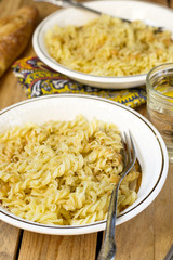 Cooked corkscrew shaped pasta Fusilli with cheese