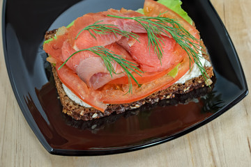 Open-faced smoked salmon sandwich