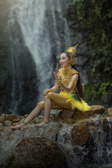 Fototapeta na wymiar Beautiful Thai girl in Thai traditional costume.in Thailand.