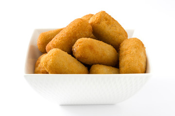 Traditional fried Spanish croquettes isolated on white background
