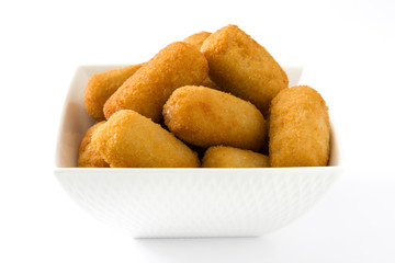 Traditional fried Spanish croquettes isolated on white background
