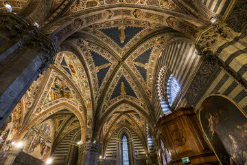 Fototapeta premium details of the battistero di san Giovanni, Siena, Italy