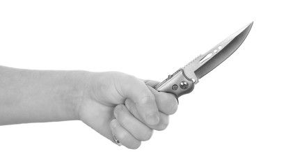 hand holding knife isolated on white background