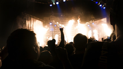 silhouette people rock show