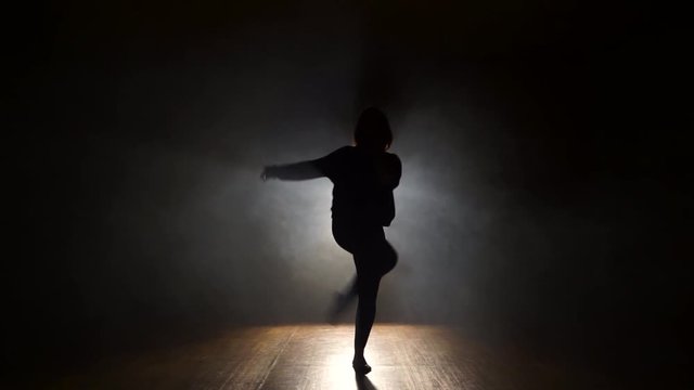 Female Dancer Backlit, in smoke.