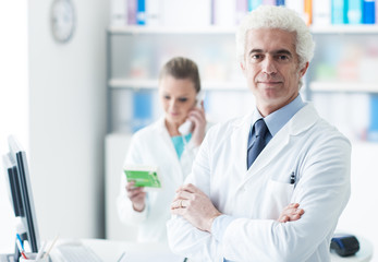 A doctor with his assistant in the office