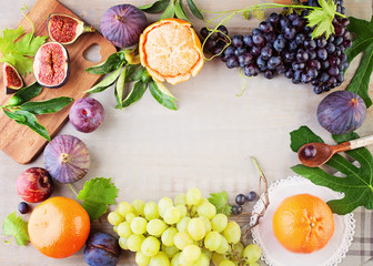 Healthy Food Background with Fruit, Berries, Wooden Board and Co