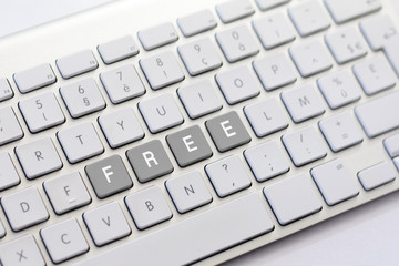 FREE writing on white keyboard