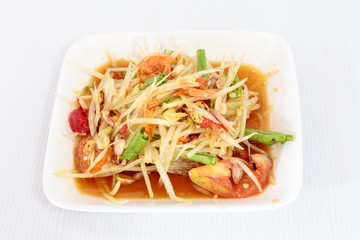 Thai food papaya salad on white dish