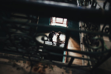 Happy newlyweds in an old house