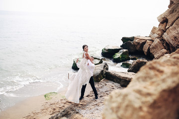 Newlyweds and beautiful seascape