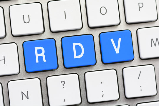RDV writing on white keyboard
