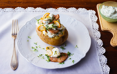 Baked potato with curd, beef and mushroom
