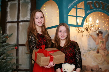 Girl twins celebrating new year 
