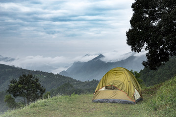 Tourist tent in camp among meadow in the mountain : North Thailand