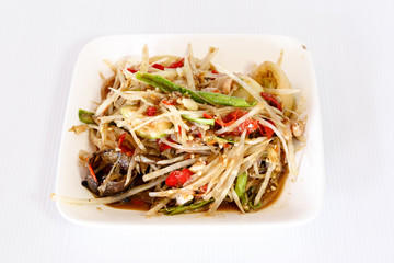 Thai food papaya salad on white dish