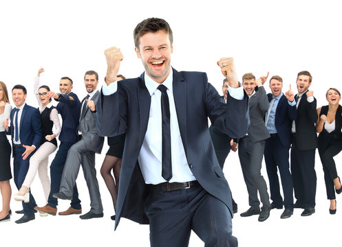 One very happy energetic businessman with his arms raised