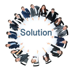 Happy business team pointing at something