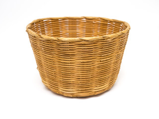Fototapeta premium Empty brown wicker woven basket isolated