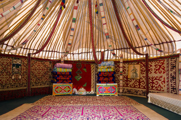 Interior of the yurt, nomadic movable house typical of central asia - 128638369
